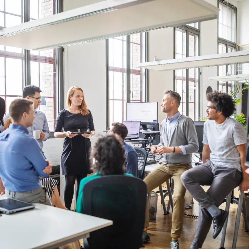 A group of employees participating in an AIM Closed Cohort training session